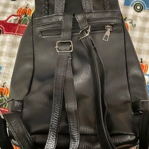 Black backpack with cute design